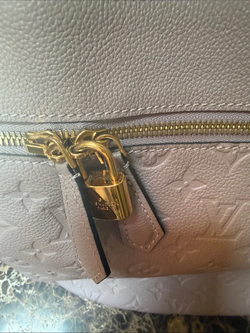Louis Vuitton Taupe Empreinte Spontini Shoulder Bag with Gold Hardware.